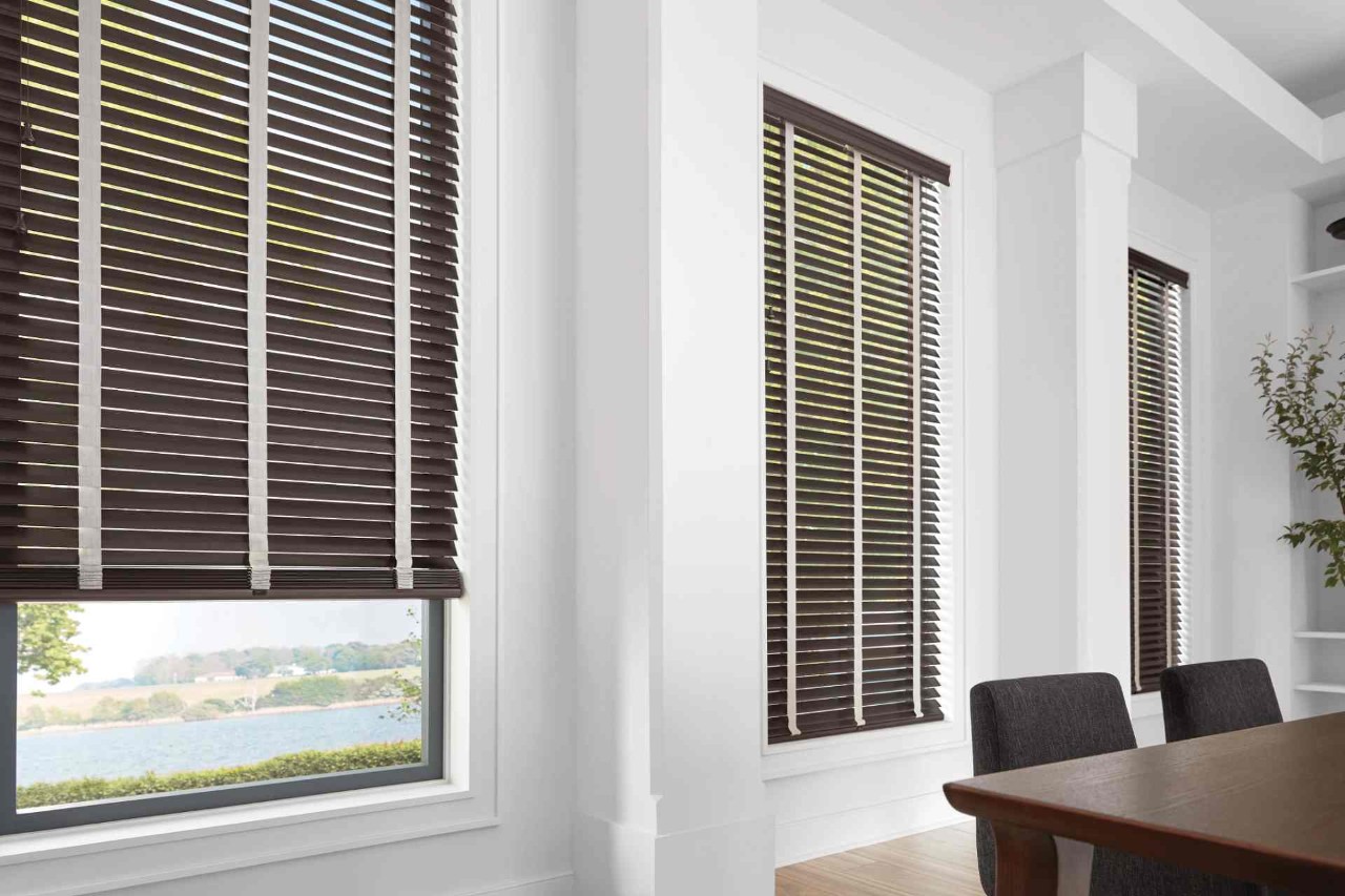Dining room with wooden blinds near Norwalk, CT.